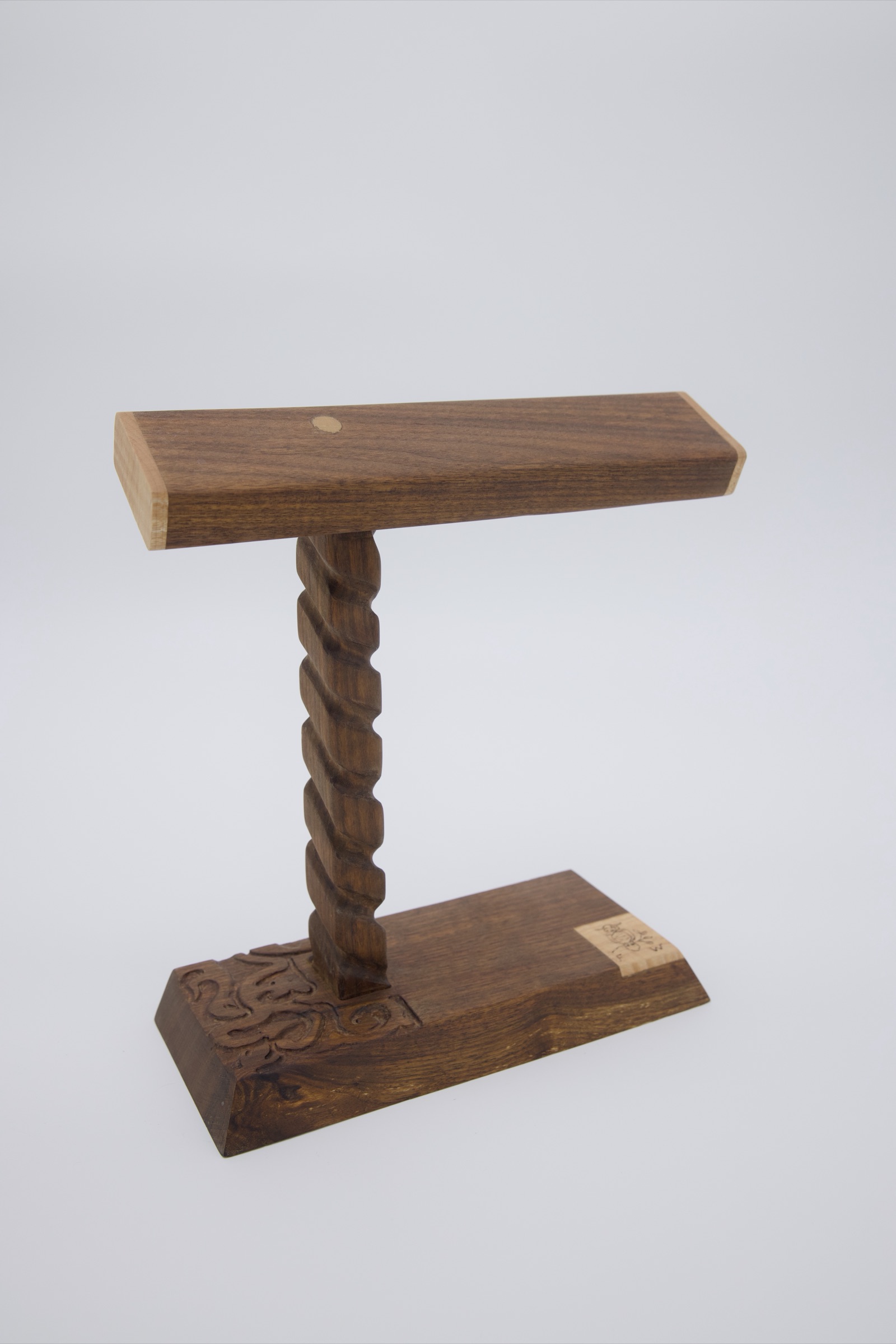 Watch stand with twisted column