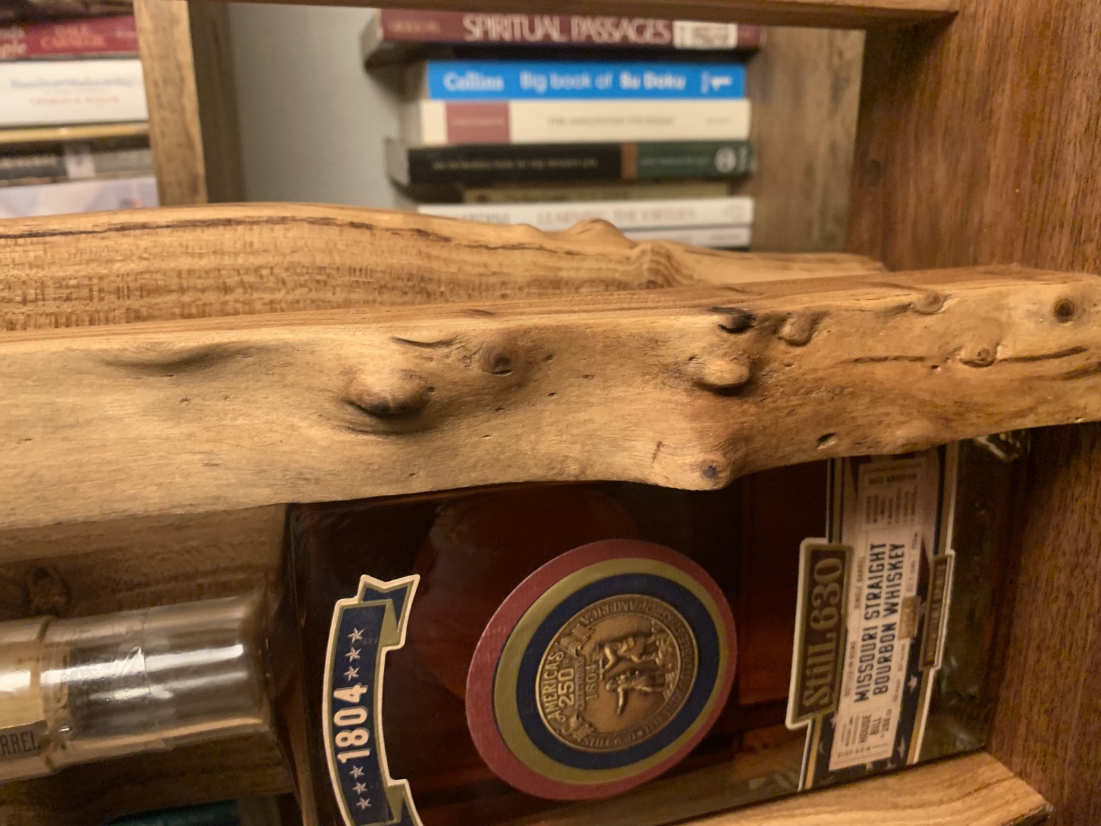 Whiskey case live edge shelf detail